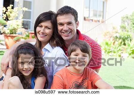 Stock Photo - Family in the garden. Fotosearch