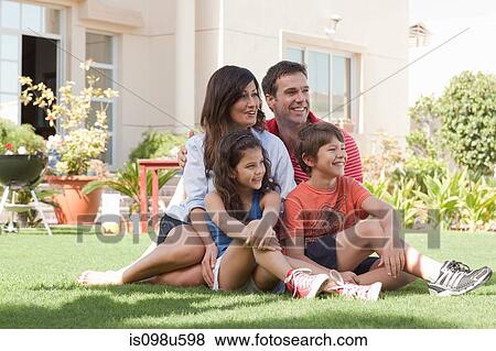 Family in the garden View Large Photo Image Stock Photo - Family in the garden. Fotosearch