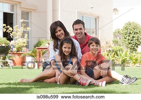 Family in the garden View Large Photo Image Stock Photo - Family in the garden. Fotosearch