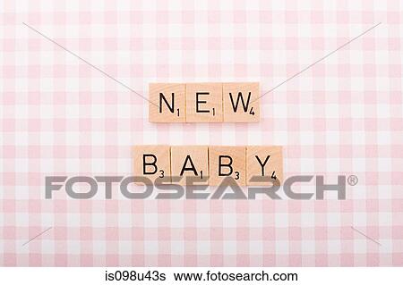 Game tile letters spelling new baby View Large Photo Image Stock Photograph - Game tile letters spelling new baby. Fotosearch