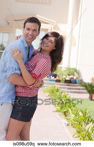 Happy couple in garden View Large Photo Image Stock Photography - Happy couple in garden. Fotosearch