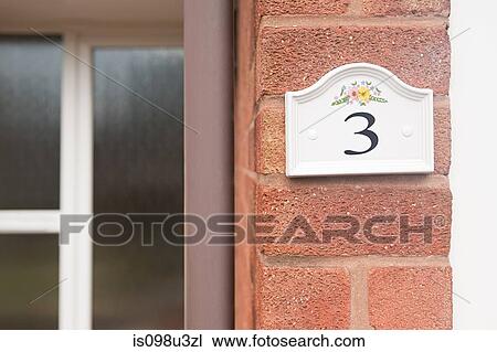 Stock Image - House number three. Fotosearch