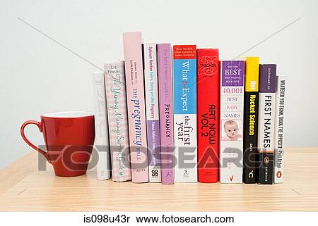 Mug and parenting books View Large Photo Image Stock Photography - Mug and parenting books. Fotosearch