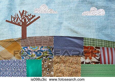 Patchwork field and bare tree View Large Photo Image Stock Image - Patchwork field and bare tree. Fotosearch