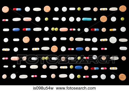 Stock Photo - Rows of pills on black background. Fotosearch