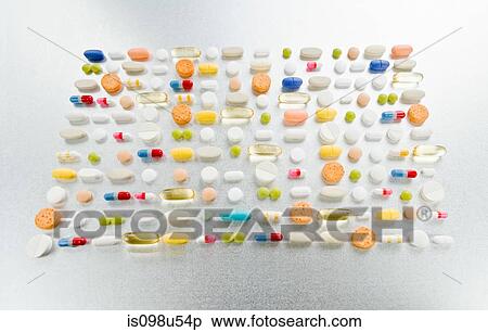 Rows of pills on grey background View Large Photo Image Stock Photography - Rows of pills on grey background. Fotosearch