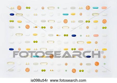 Rows of pills on white background View Large Photo Image Stock Photography - Rows of pills on white background. Fotosearch
