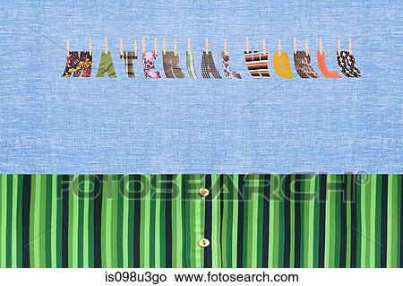 The words Material World hanging from a clothesline View Large Photo Image Picture - The words Material World hanging from a clothesline. Fotosearch