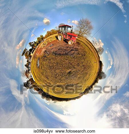 Tractor in field with little planet effect View Large Photo Image Stock Photo - Tractor in field with little planet effect. Fotosearch