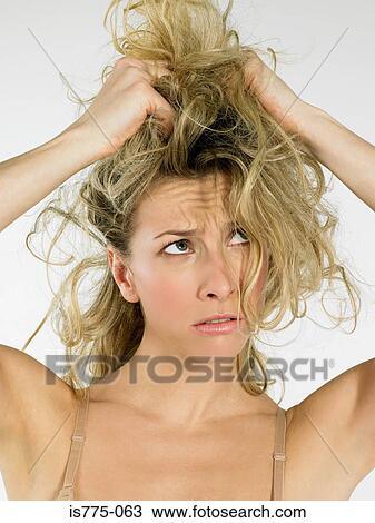 Woman with messy hair View Large Photo Image Stock Image - Woman with messy hair. Fotosearch