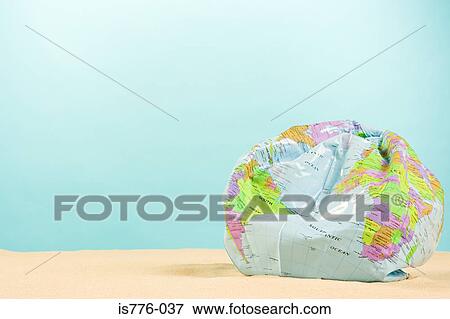 Deflated globe View Large Photo Image Stock Photo - Deflated globe. Fotosearch