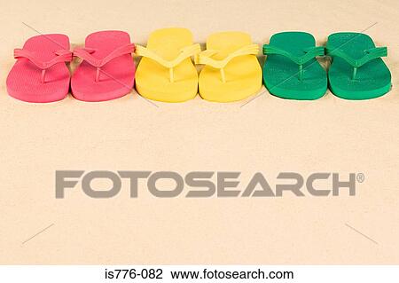 Stock Image - Flip flops in a row. Fotosearch