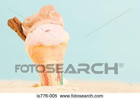 Ice cream in sand View Large Photo Image Stock Photography - Ice cream in sand. Fotosearch