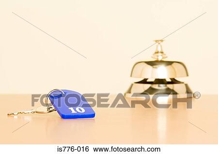 Key and counter bell at hotel View Large Photo Image Stock Photograph - Key and counter bell at hotel. Fotosearch