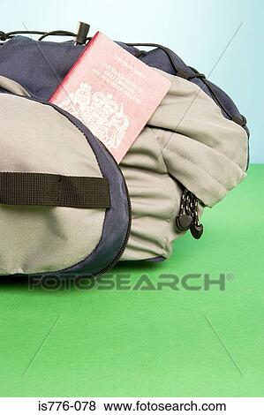 Passport in a backpack View Large Photo Image Stock Photo - Passport in a backpack. Fotosearch