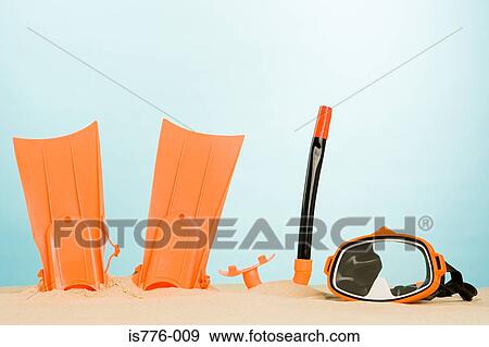 Snorkelling equipment in sand View Large Photo Image Stock Photo - Snorkelling equipment in sand. Fotosearch