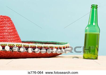 Sombrero and beer bottle View Large Photo Image Picture - Sombrero and beer bottle. Fotosearch