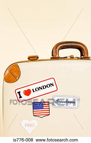 Suitcase with stickers View Large Photo Image Stock Photo - Suitcase with stickers. Fotosearch