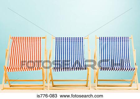 Three deckchairs View Large Photo Image Stock Image - Three deckchairs. Fotosearch