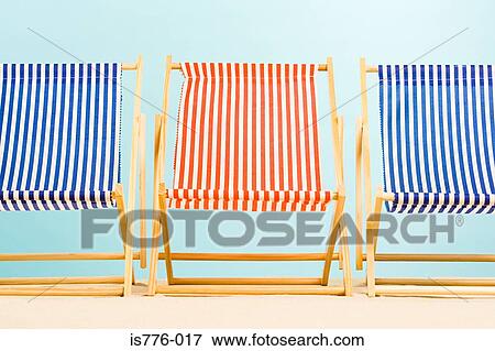 Three deckchairs View Large Photo Image Stock Photo - Three deckchairs. Fotosearch
