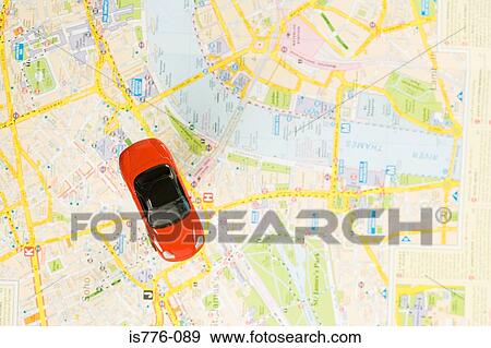 Stock Photo - Toy car on map of london. Fotosearch