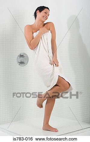 Stock Photograph - Woman drying herself. Fotosearch