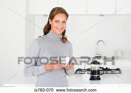 Woman having coffee View Large Photo Image Stock Image - Woman having coffee. Fotosearch