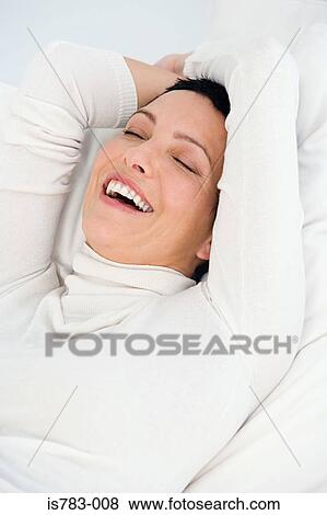 Woman relaxing View Large Photo Image Stock Photo - Woman relaxing. Fotosearch