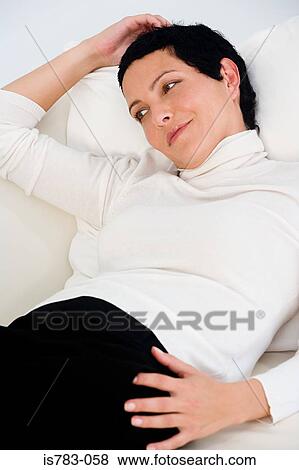 Stock Photo - Woman relaxing. Fotosearch