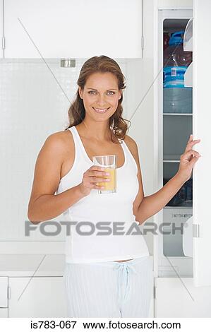 Woman with drink View Large Photo Image Stock Photo - Woman with drink. Fotosearch