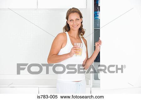 Woman with drink View Large Photo Image Stock Photography - Woman with drink. Fotosearch