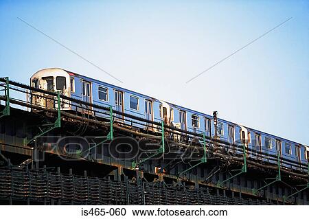 Train on a bridge View Large Photo Image Stock Image - Train on a bridge. Fotosearch