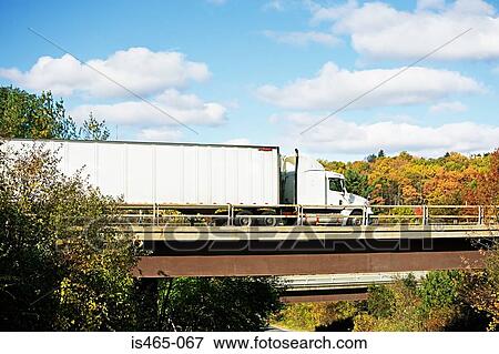 Truck on a bridge View Large Photo Image Stock Photo - Truck on a bridge. Fotosearch