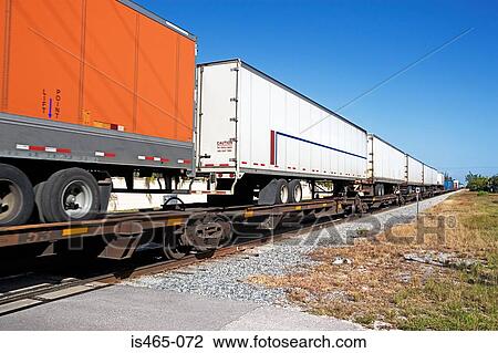 Truck trailers on a cargo container View Large Photo Image Stock Image - Truck trailers on a cargo container. Fotosearch