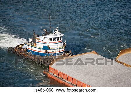 Tugboat and barges View Large Photo Image Stock Photo - Tugboat and barges. Fotosearch
