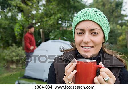 Woman with a hot drink View Large Photo Image Picture - Woman with a hot drink. Fotosearch