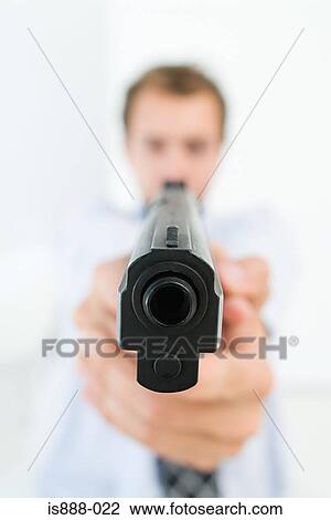 Stock Image - Man aiming gun. Fotosearch