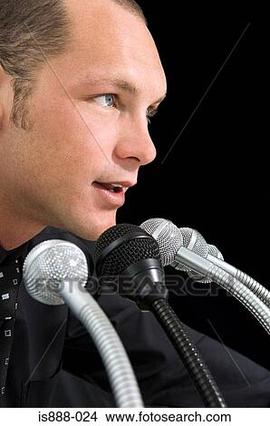 Picture - Man giving presentation. Fotosearch