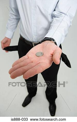 Man holding coin in palm of hand View Large Photo Image Stock Image - Man holding coin in palm of hand. Fotosearch