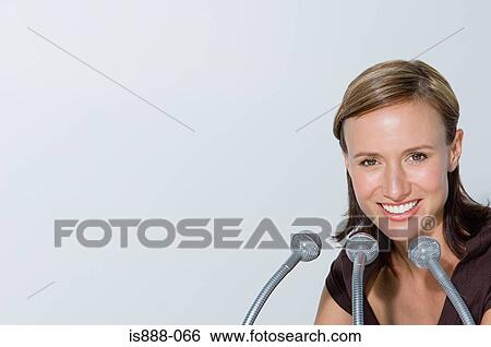 Stock Photograph - Woman giving presentation. Fotosearch