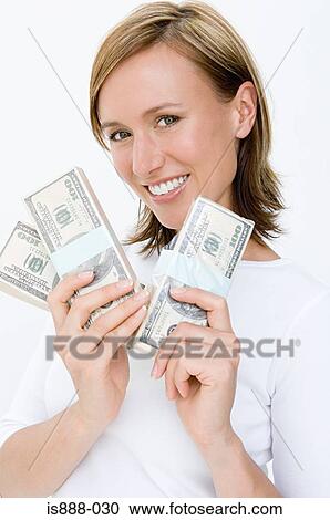 Woman holding cash View Large Photo Image Stock Image - Woman holding cash. Fotosearch