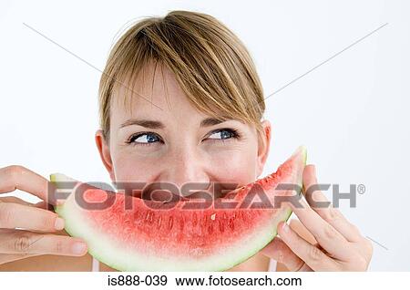 Woman holding watermelon View Large Photo Image Stock Photo - Woman holding watermelon. Fotosearch