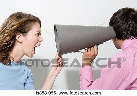Woman shouting down megaphone View Large Photo Image Stock Photograph - Woman shouting down megaphone. Fotosearch