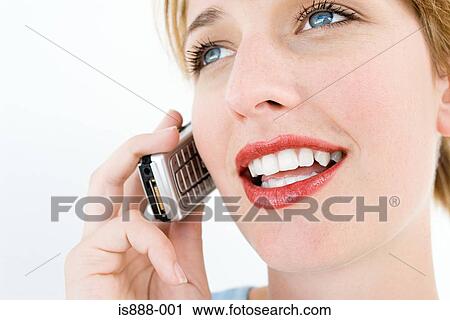 Woman using cell phone View Large Photo Image Stock Image - Woman using cell phone. Fotosearch