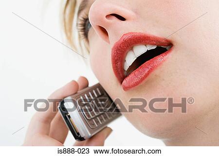 Woman using cell phone View Large Photo Image Stock Image - Woman using cell phone. Fotosearch