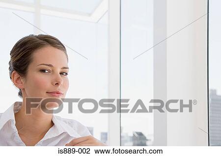 Stock Image - Portrait of a businesswoman. Fotosearch