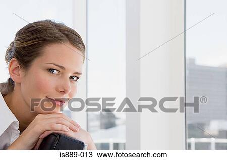 Stock Image - Portrait of a businesswoman. Fotosearch