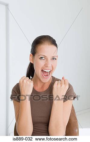 Woman cheering View Large Photo Image Stock Image - Woman cheering. Fotosearch