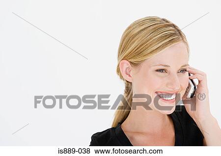 Woman using cell phone View Large Photo Image Stock Photo - Woman using cell phone. Fotosearch