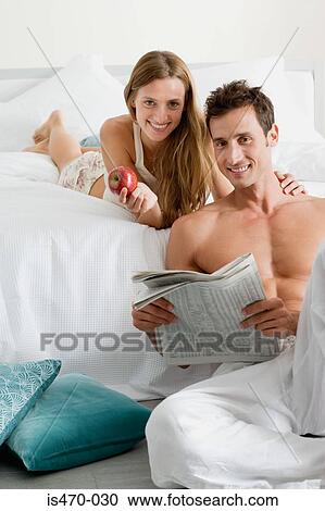 Couple relaxing View Large Photo Image Stock Image - Couple relaxing. Fotosearch
